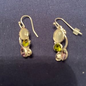 Silver earrings with peridot lilac color stones